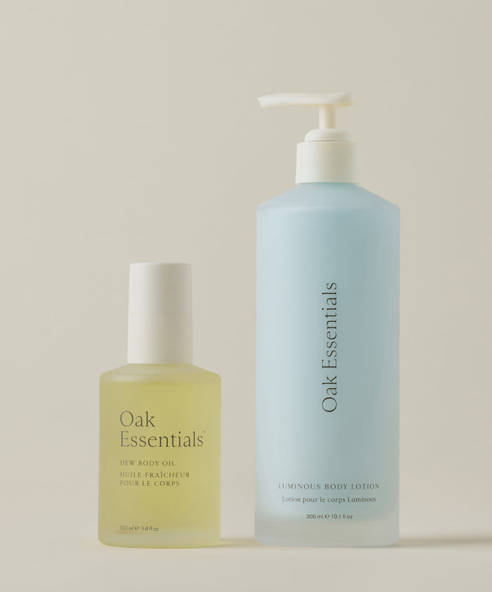 The Body Hydration Heroes set—featuring two Oak Essentials favorites—stands as the perfect duo for glowing, hydrated skin, beautifully displayed on a neutral surface.