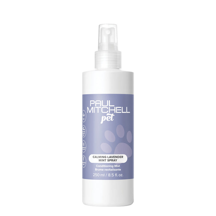A bottle of Paul Mitchell Pet Calming Lavender Mint Spray with a white spray nozzle. The label displays the brand name, product name, and the scent 'Calming Lavender Mint'.