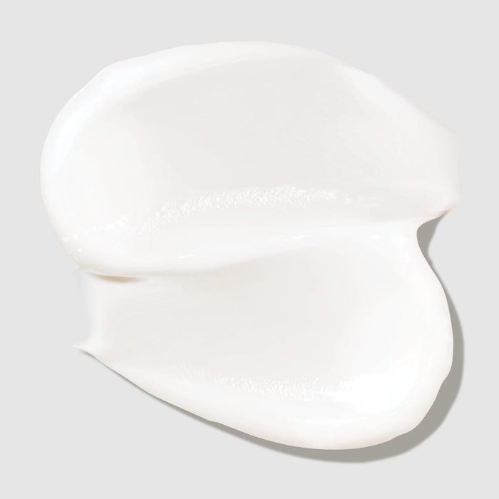 Paul Mitchell Clean Beauty Color Protect Conditioner smear on a neutral background