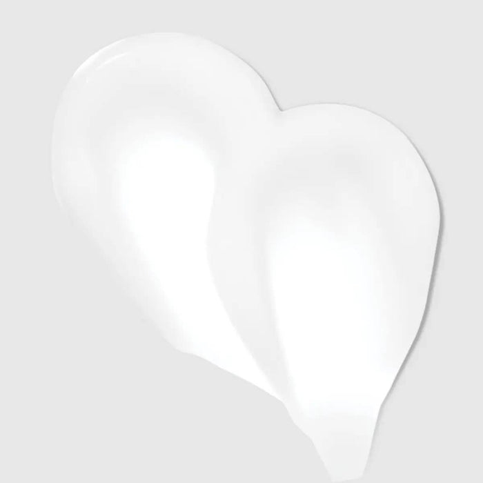 Clean Beauty Color Protect Leave-In Treatment smear on a neutral background