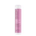 A bottle of Clean Beauty Color Protect Shampoo by Paul Mitchell on a white background