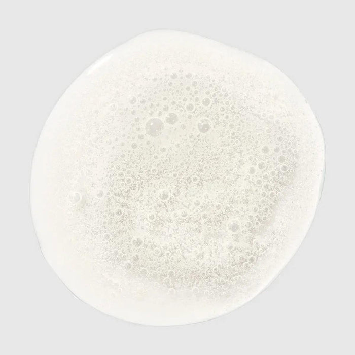 Clean Beauty Color protect Shampoo smear on a neutral background