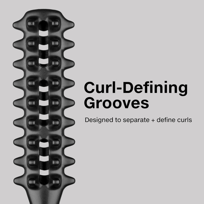 The Curl Brush features curl-defining grooves designed to separate and define curls.