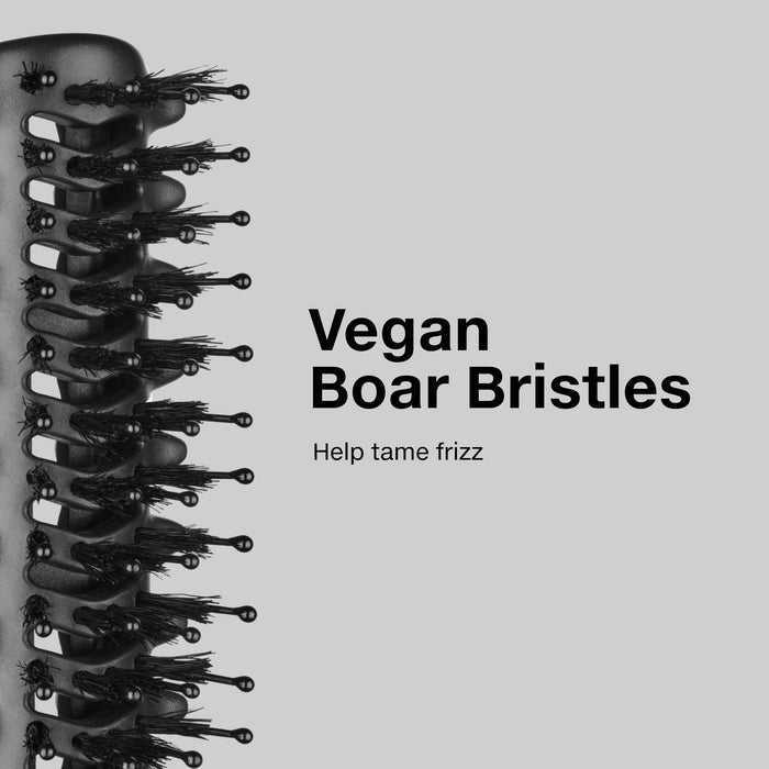 The Curl Brush has vegan boar bristles to help tame frizz.
