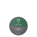 A container of Mitch Dry Paste hair styling product with high hold and ultra-matte finish, labeled as texture clay.