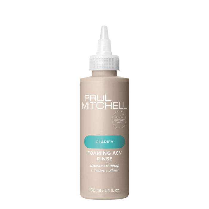 A bottle of Paul Mitchell Foaming ACV Rinse designed for clarifying hair and scalp, on a white background