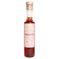 Bottle of sangria drinking vinegar with a white label on a white background