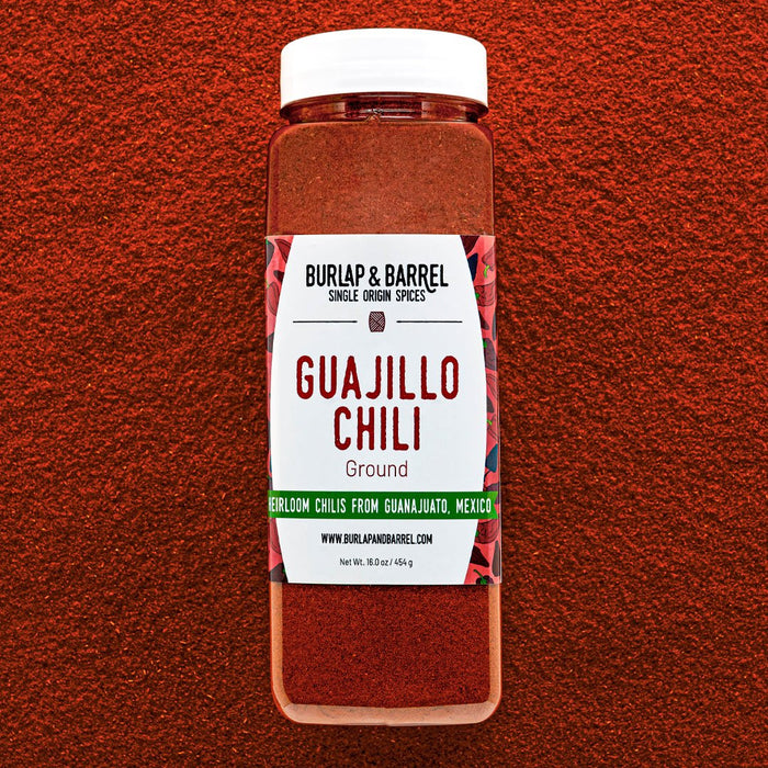 Container of Burlap & Barrel Guajillo Chili on a red background