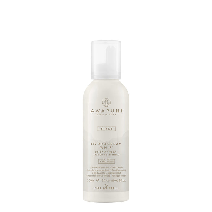 A pump bottle of Awapuhi Wild Ginger HydroCream Whip Mousse hair styling mousse.