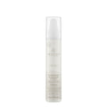 A white spray bottle with a label reading 'HydroMist Blowout Spray' from the brand Awapuhi Wild Ginger.