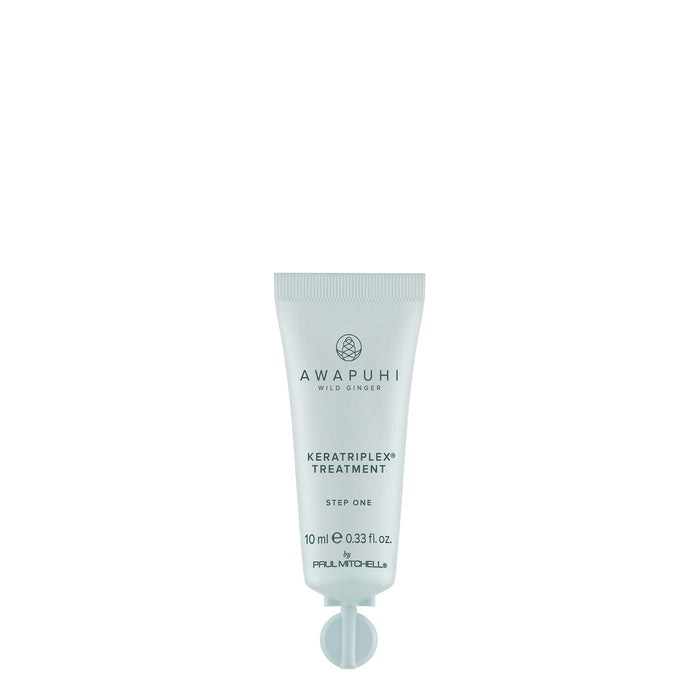 A tube of Awapuhi Wild Ginger KeraTriplex Treatment designed for hair care.