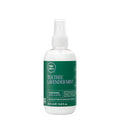 A bottle of Tea Tree Lavender Mint Conditioning Leave-In Spray on a white background