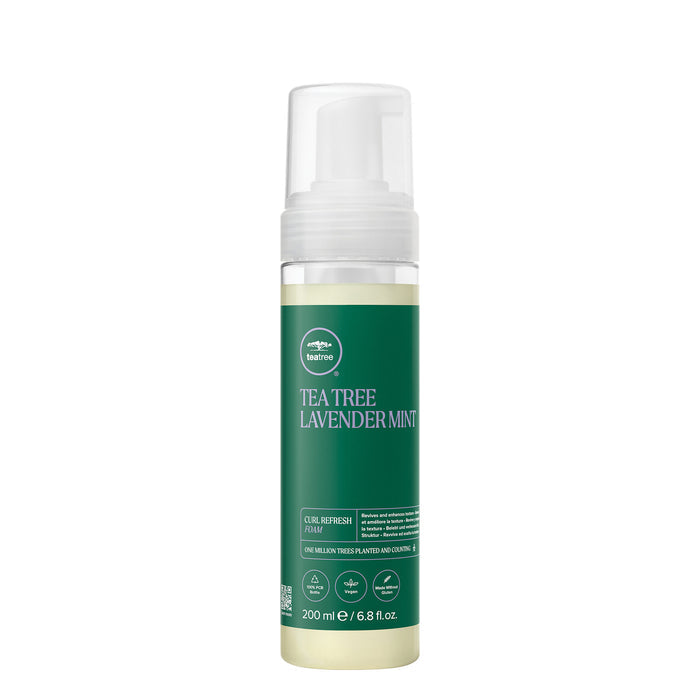 A bottle of Tea Tree Lavender Mint Curl Refresh Foam on a white background