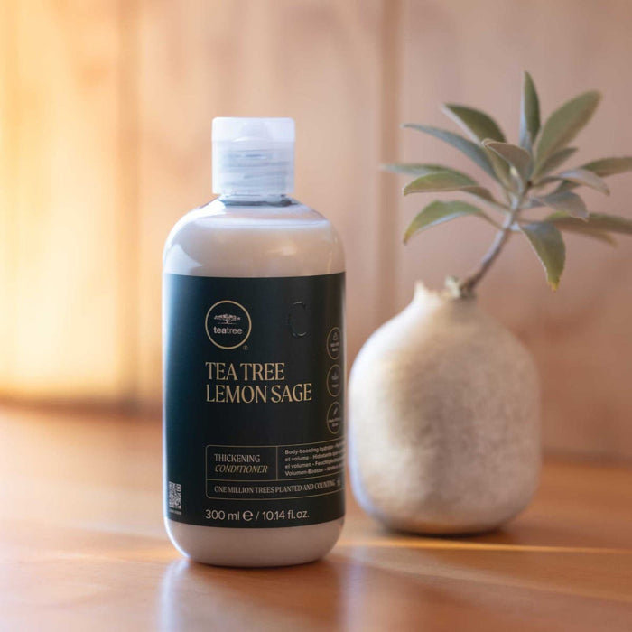 Lemon Sage Thickening Conditioner in a lifestyle setting