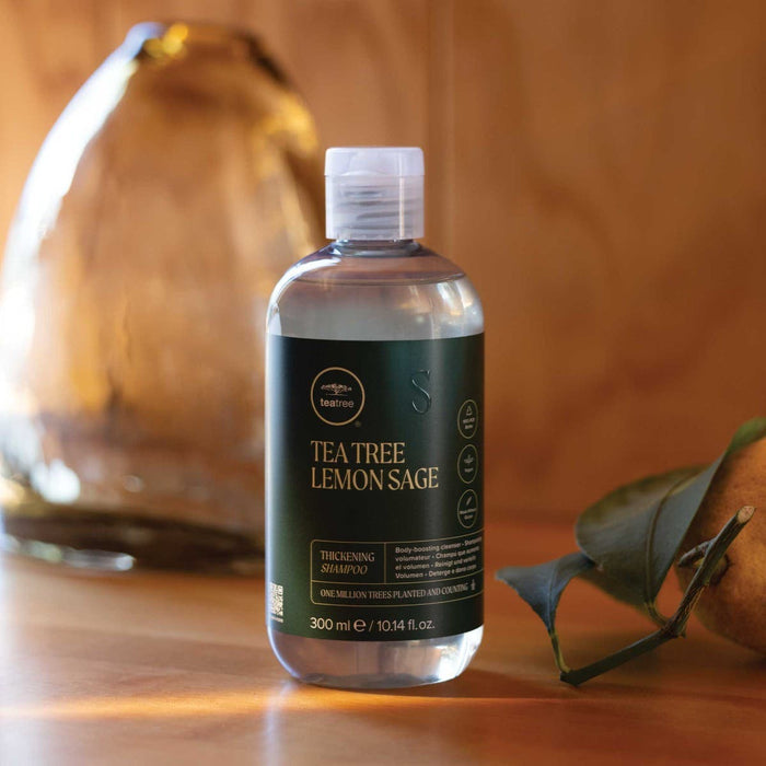 Tea Tree Lemon Sage Thickening Shampoo in a lifestyle setting