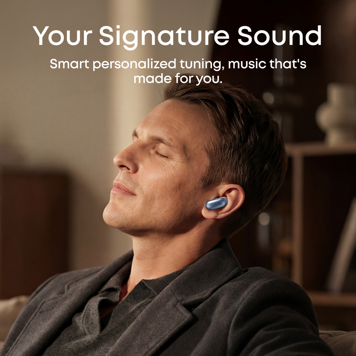 Man wearing soundcore Liberty 5 Pro ANC earbuds enjoying smart personalized sound tuning for a custom music experience