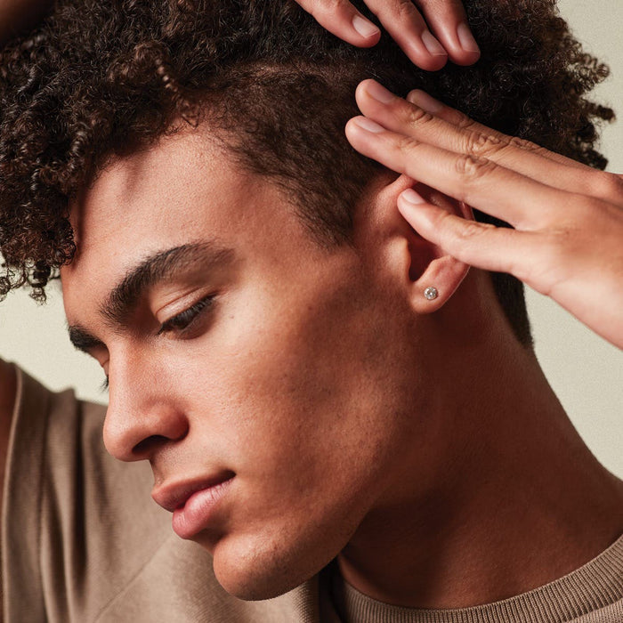 Men’s coily hair styled with MITCH Original Pomade.