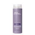 A bottle of Paul Mitchell Platinum Blonde Violet Conditioner on a white background