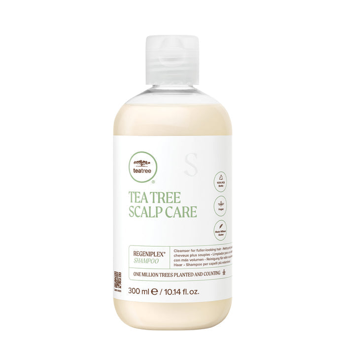 A bottle of Tea Tree Scalp Care Regeniplex Shampoo on a white background