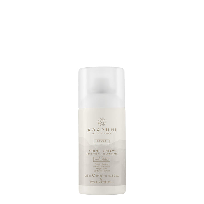 A bottle of Awapuhi Shine Spray with a white, clear design and green labeling, indicating it is a hair styling product.