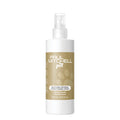 A bottle of Soothing Oatmeal Conditioning Spray by Paul Mitchell Pet, designed for pet grooming.