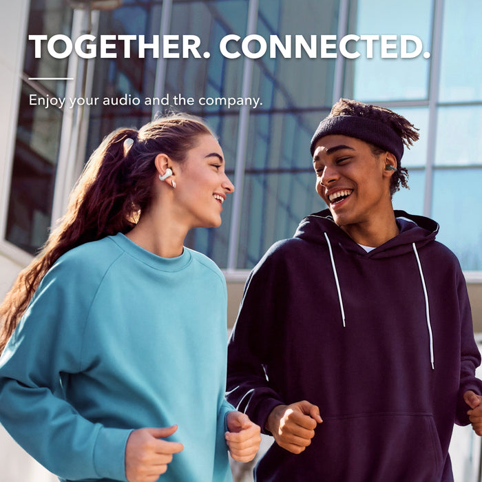 Two people running with soundcore earbuds