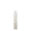 A white bottle with a pump dispenser containing Awapuhi Wild Ginger Styling Treatment Oil.