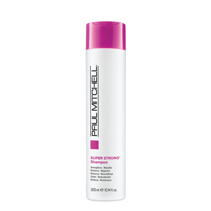 A bottle of Paul Mitchell Super Strong Shampoo with pink and white packaging.