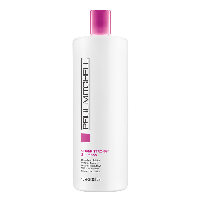 A bottle of Paul Mitchell Super Strong Shampoo with pink and white packaging.