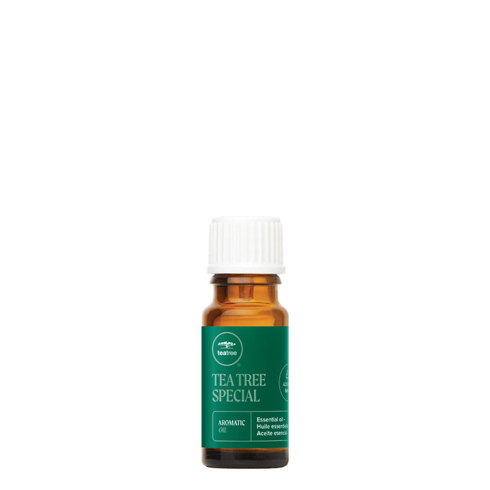 A small bottle of Tea Tree Special Aromatic Oil on a white background
