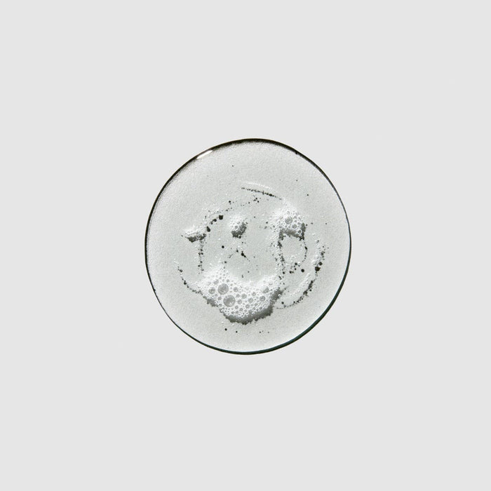 Tea Tree Hand Soap texture smear on a neutral background