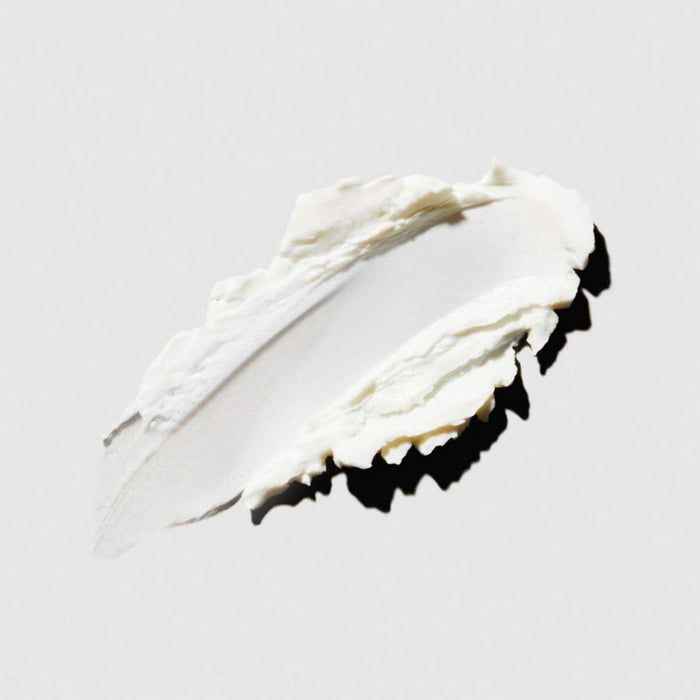 Tea Tree Special Shaping Cream texture smear on a neutral background