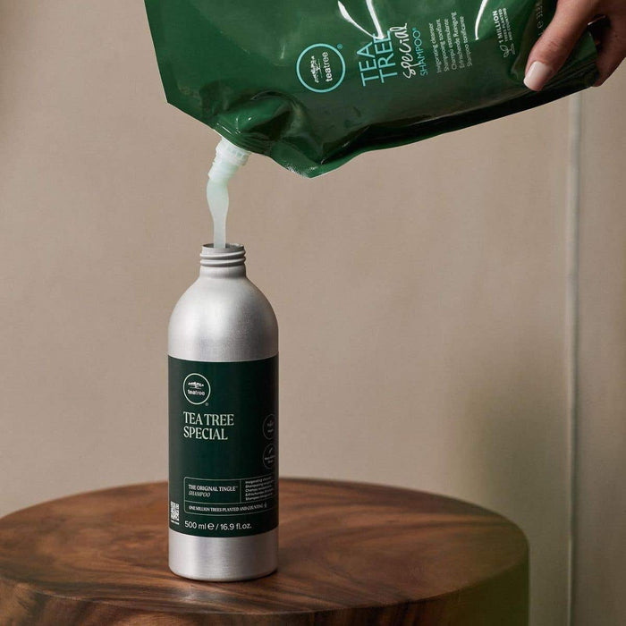 Tea Tree Special Refill Pouch refilling a Tea Tree Special Aluminum Bottle