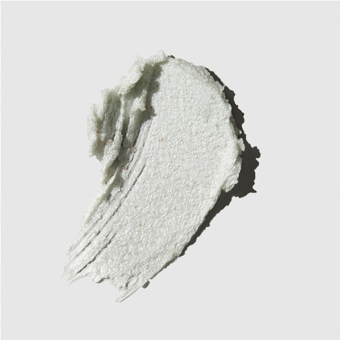 Tea Tree Special Detox Foaming Salt Scrub smear on a neutral background