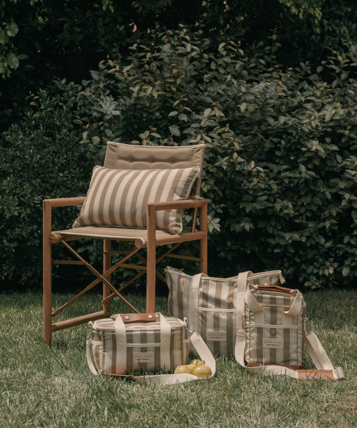 Beach bag with stripes with a grass background