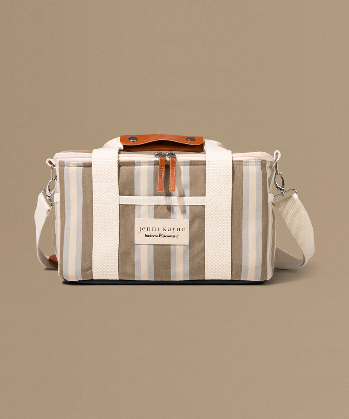 Striped bag with a visible brand label on a beige background